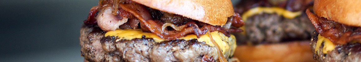 Eating Burger at Crow's Burger Shop restaurant in Belton, TX.